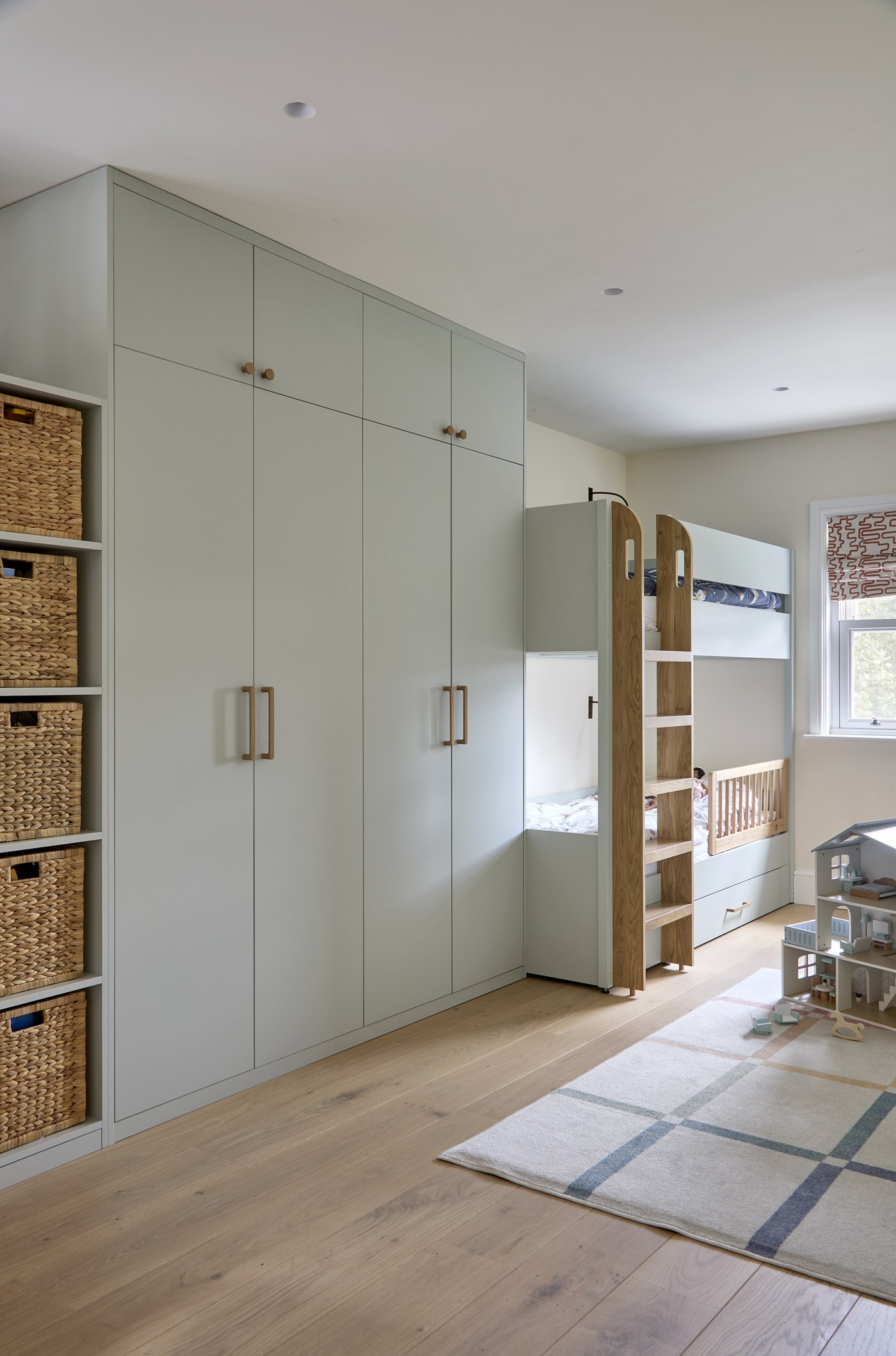Full-height fitted storage joinery at Achilles Road