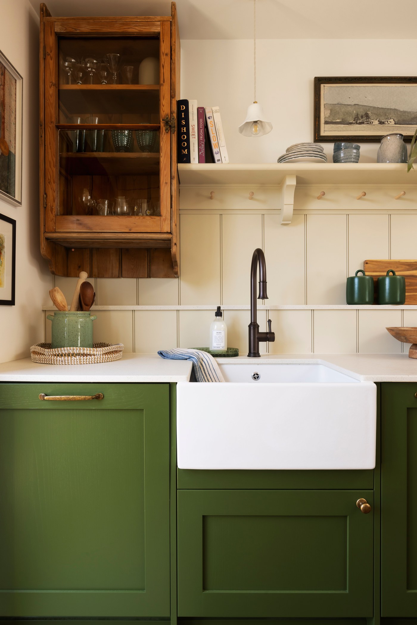 Kitchen at Garratt Lane with painted joinery, tongue-and-groove panelling and a butler sink