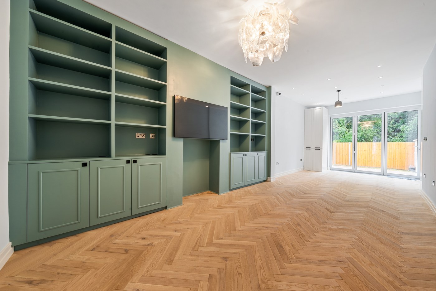 Fitted joinery unit in a living room at Millway