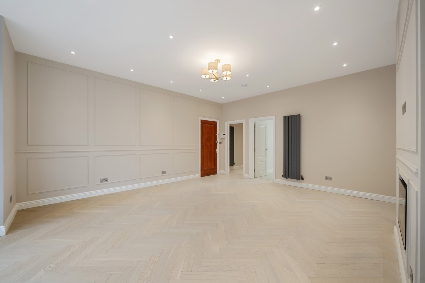 Panelled reception room at St John's Wood Road with double doors through to the hall